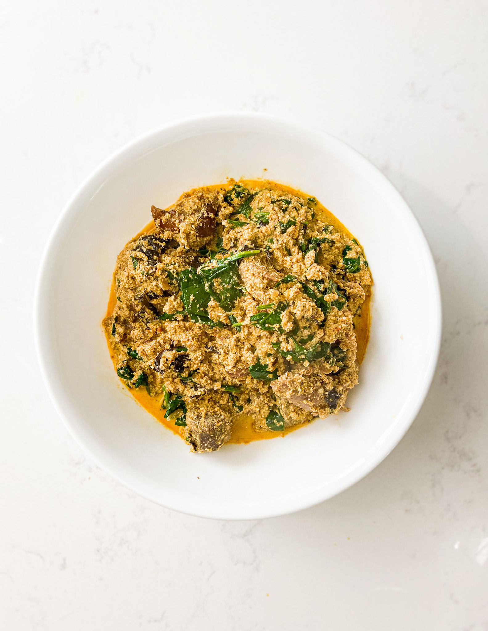 plated egusi soup with bitter leaf