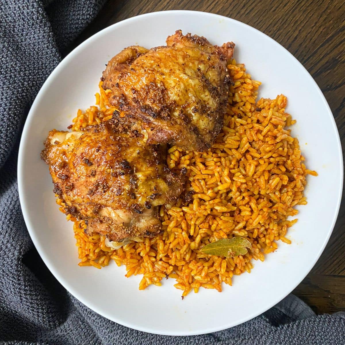 plated jollof rice and chicken