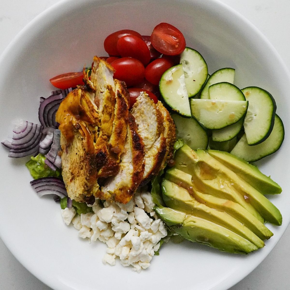turmeric chicken salad in a white bowl